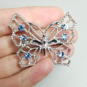Vintage Butterfly Brooch, Blue Rhinestone and Silver Tone Cut Out Design Pin